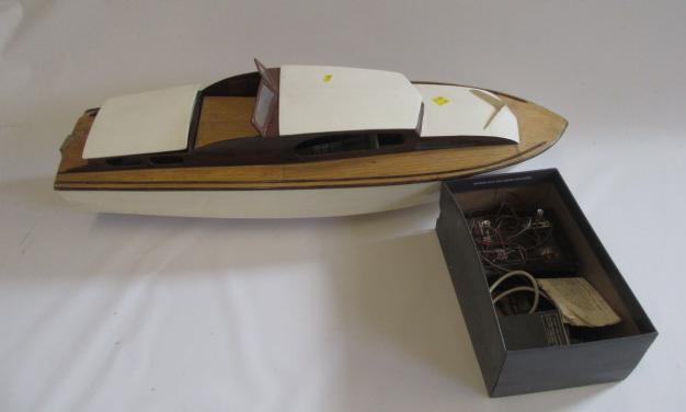 A model cabin cruiser fitted with electric motor and radio control Image