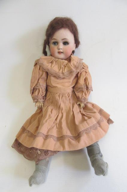 A Simon & Halbig bisque socket head doll Image