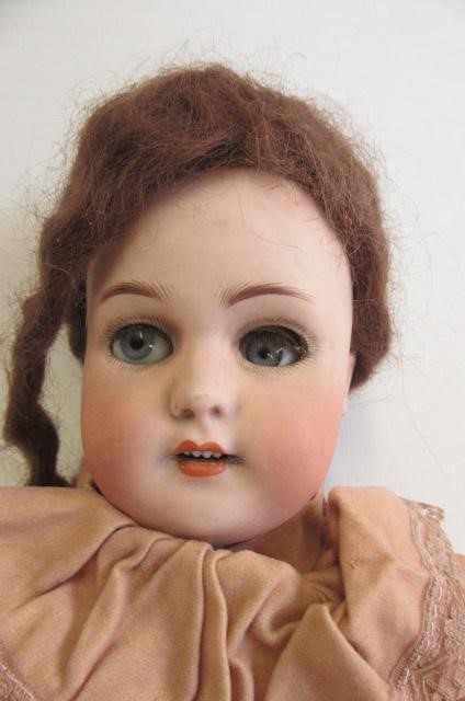 A Simon & Halbig bisque socket head doll Image