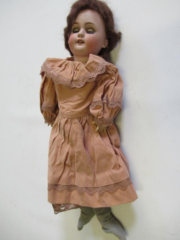 A Simon & Halbig bisque socket head doll Image