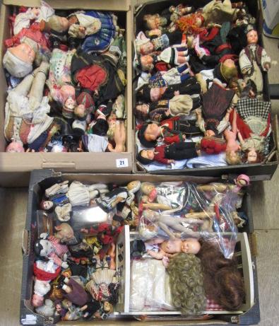 A large collection of national costume dolls Image