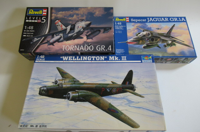 Three 1:48 scale kits comprising Revell Tornado GR4 Jaguar GR1 and Trumpeter Wellington MKIII Image