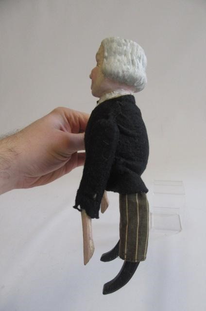 A Lloyd George clockwork doll Image