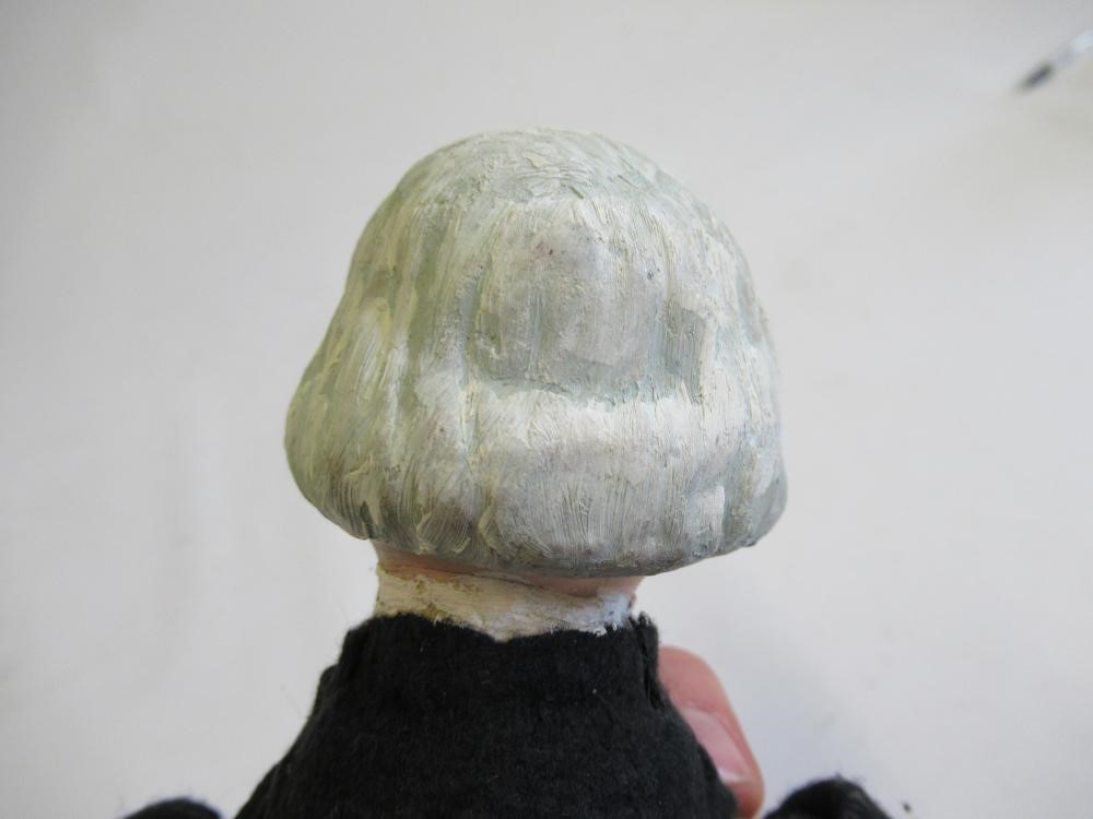 A Lloyd George clockwork doll Image