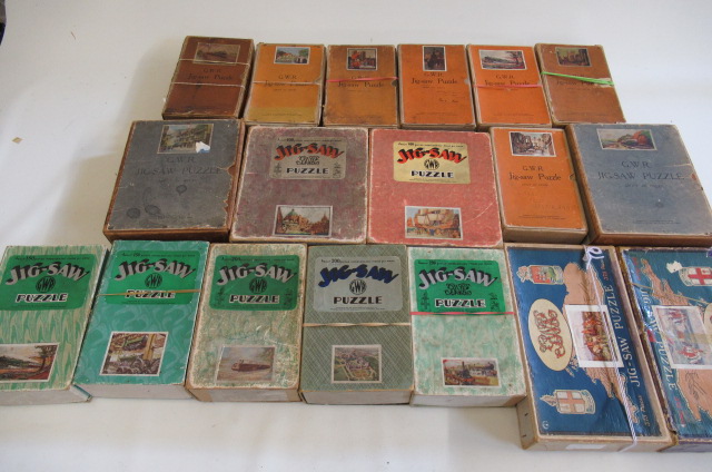 Eighteen Great Western Railway wooden jigsaw puzzles of railway and historic scenes (Est. plus 21% Image