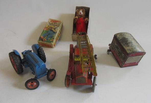 Playworn tinplate toys including fire engine Image