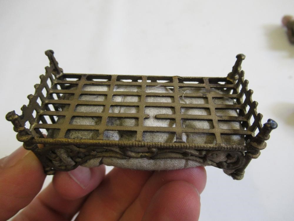 A pair of French all bisque dolls house dolls Image