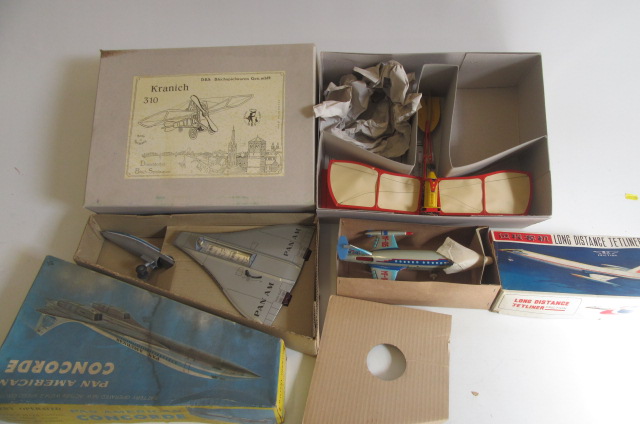 Three tinplate aircraft models comprising Modern Issue by D.B.S. clockwork monoplane Image