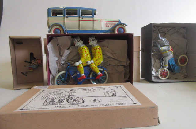 Four Modern Issue clockwork tinplate toys by Paya and D.B.S. comprising monkey Image