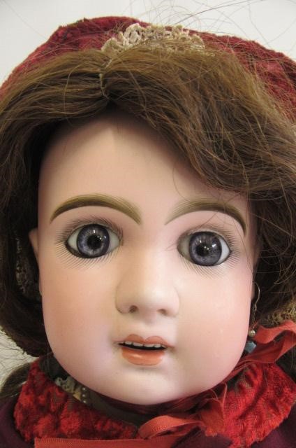 A Tete Jumeau size 12 bisque socket head doll Image