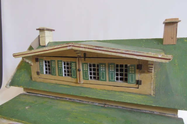 A rare pre-war "Moko" dolls house of painted wooden construction Image