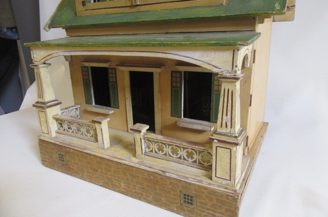 A rare pre-war "Moko" dolls house of painted wooden construction Image