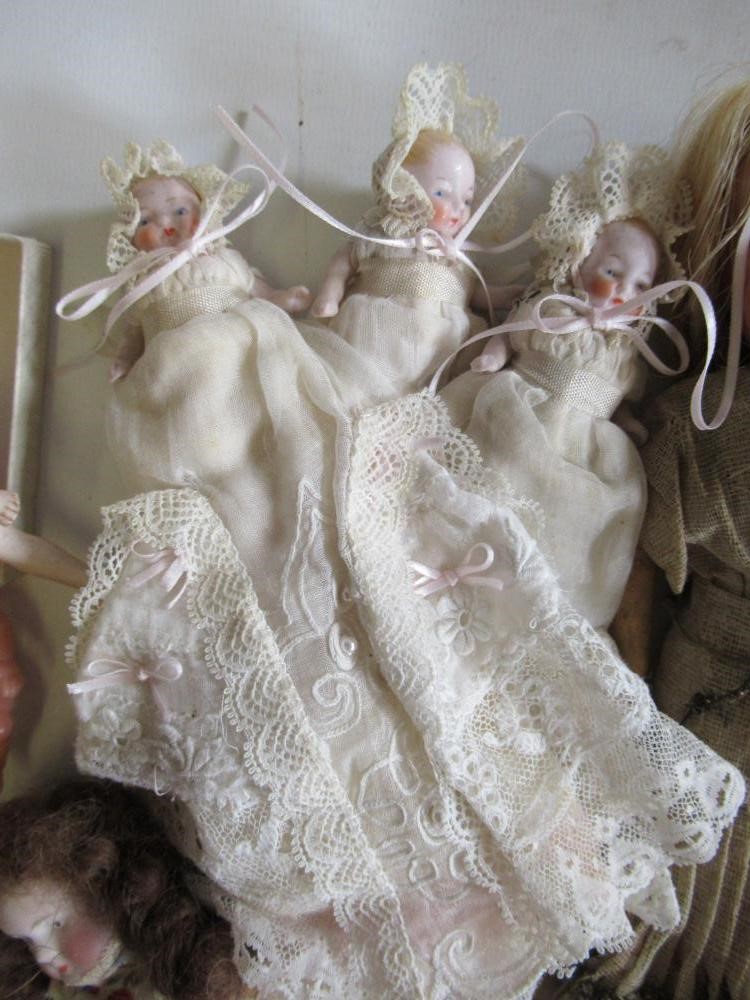 A collection of seventeen miniature dolls with bisque and celluloid examples including an S.F.B.J. Image