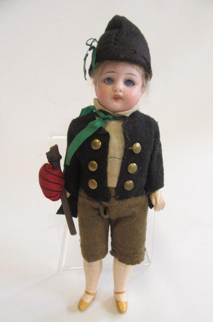 A Simon & Halbig bisque socket head boy doll with blue glass sleeping eyes Image