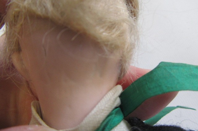 A Simon & Halbig bisque socket head boy doll with blue glass sleeping eyes Image