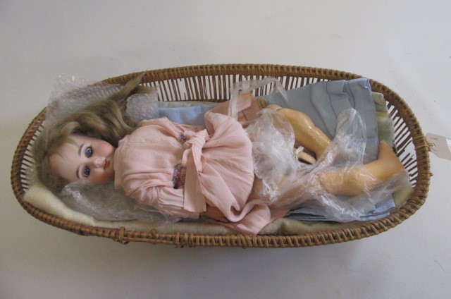 An Armand Marseille 1894 bisque socket head doll Image