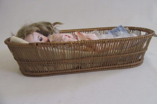 An Armand Marseille 1894 bisque socket head doll Image