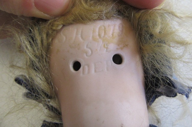 A Simon & Halbig bisque socket head doll Image