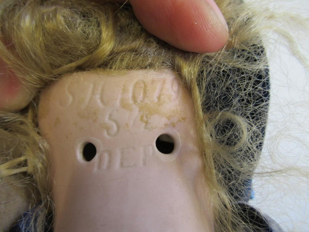 A Simon & Halbig bisque socket head doll Image