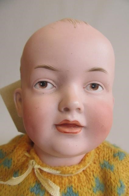 A Kley & Hahn bisque socket head baby doll with painted eyes Image