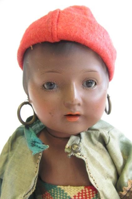 A Heubach & Koppelsdorf bisque socket head doll with brown glass fixed eyes Image