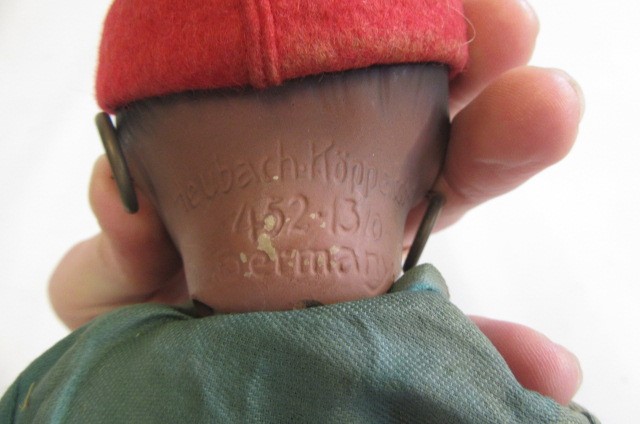 A Heubach & Koppelsdorf bisque socket head doll with brown glass fixed eyes Image