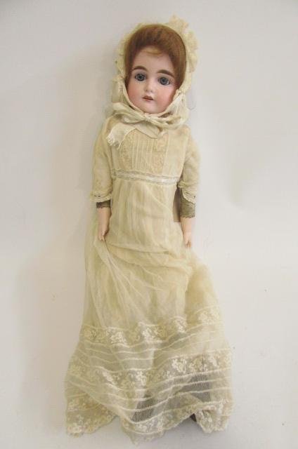 A Cuno & Otto Dressel bisque shoulder head doll Image