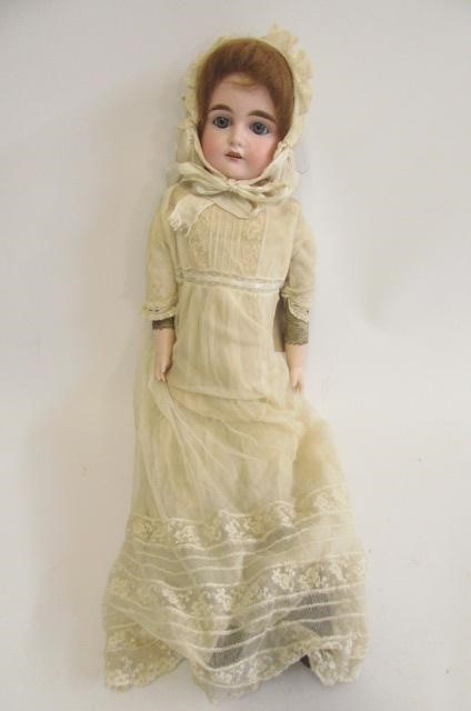 A Cuno & Otto Dressel bisque shoulder head doll Image