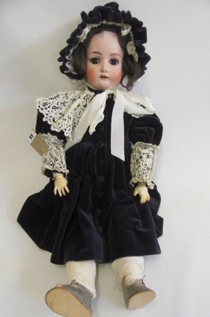 A Kestner bisque socket head doll with brown glass sleeping eyes Image