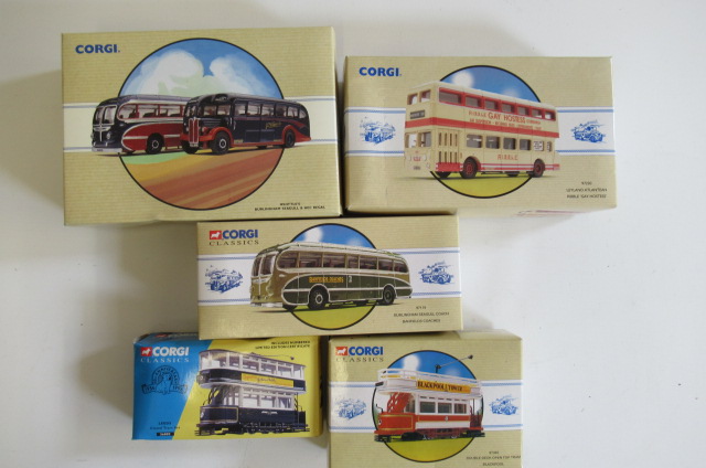 Five Corgi bus and tram models including Leeds tram Image