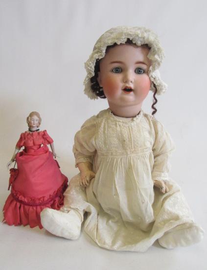 A Schutzmeister & Quendt bisque socket head character doll with blue glass sleeping eyes Image