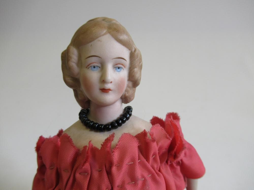 A Schutzmeister & Quendt bisque socket head character doll with blue glass sleeping eyes Image