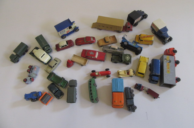 Thirty playworn mainly Matchbox vehicles including Bedford Tractor Image