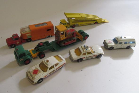 Seven playworn Matchbox King Size vehicles including car transporter and Dyson low loader Image