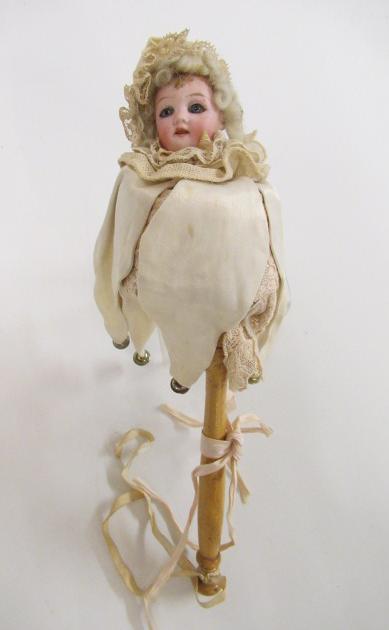 A Schoenau & Hoffmeister bisque head Marotte doll with blue glass eyes Image