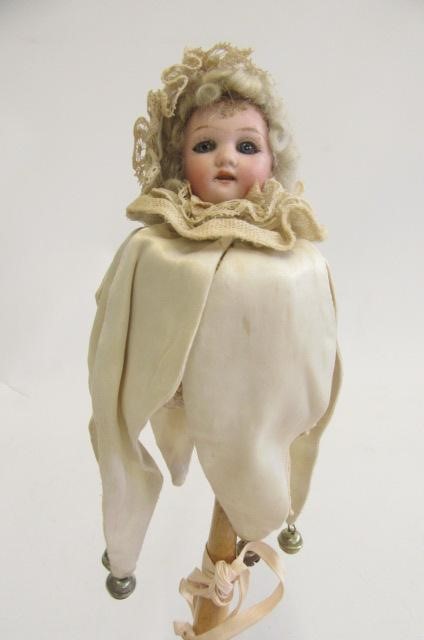 A Schoenau & Hoffmeister bisque head Marotte doll with blue glass eyes Image