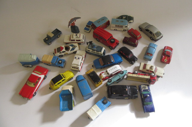 Playworn Corgi vehicles including Post Office Land Rover Image