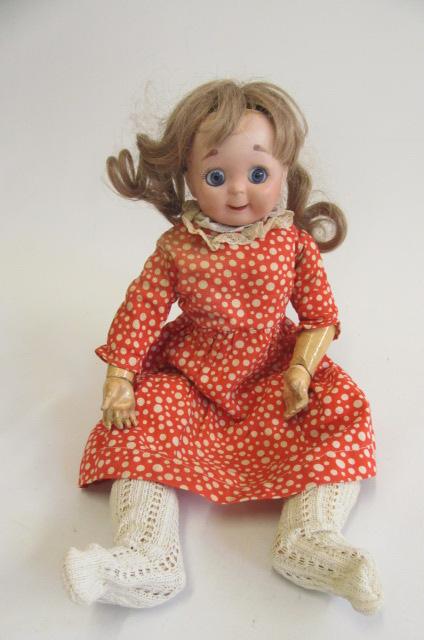 A J.D. Kestner type bisque socket head googly eyed doll with fixed blue paperweight eyes Image