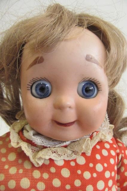 A J.D. Kestner type bisque socket head googly eyed doll with fixed blue paperweight eyes Image