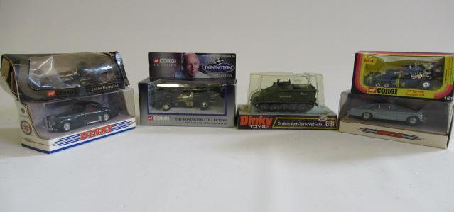 Seven Corgi and Dinky vehicles comprising Lotus Ford Cosworth Image
