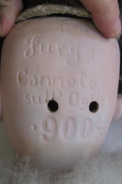 A rare Furga Canneto bisque socket head doll with blue glass paperweight sleeping eyes Image