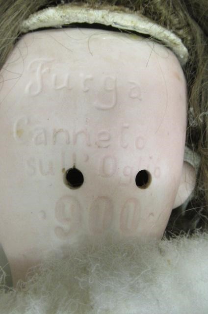 A rare Furga Canneto bisque socket head doll with blue glass paperweight sleeping eyes Image