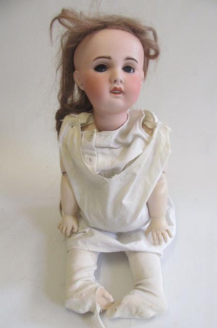 An S.F.B.J. bisque socket head doll with blue glass eyes Image