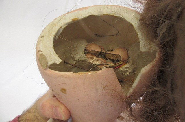 An S.F.B.J. bisque socket head doll with blue glass eyes Image