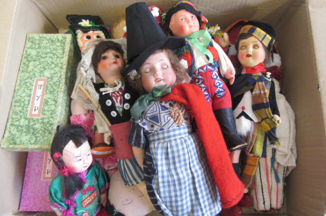 A collection of twelve small dolls including a Herman Steiner bisque socket head doll Image