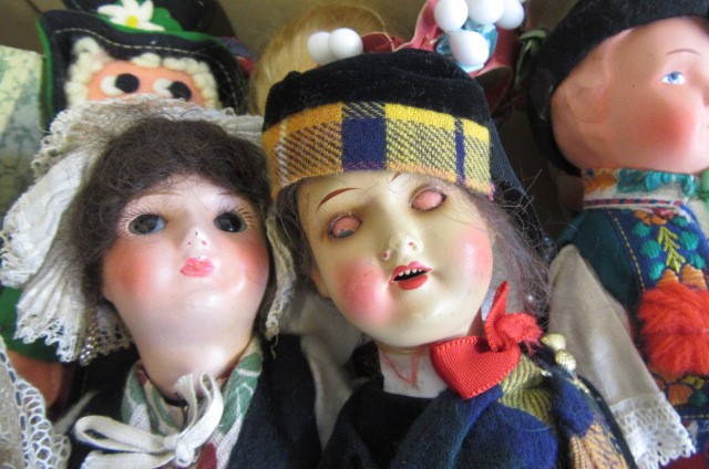 A collection of twelve small dolls including a Herman Steiner bisque socket head doll Image