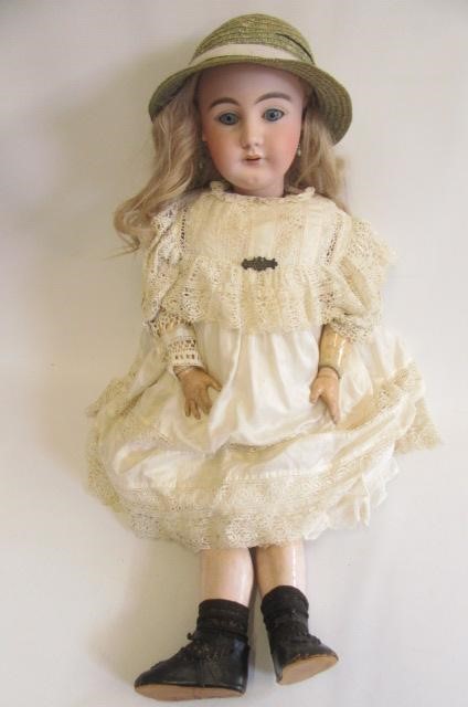 A Simon & Halbig bisque socket head doll Image
