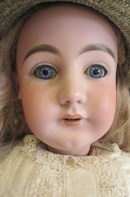 A Simon & Halbig bisque socket head doll Image