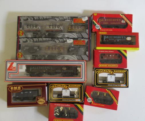 Eleven goods wagons by Bachmann and Hornby including petrol tankers Image