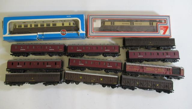 Passenger service coaches and siphon wagons by Hornby and others and two Express Parcels rail cars Image